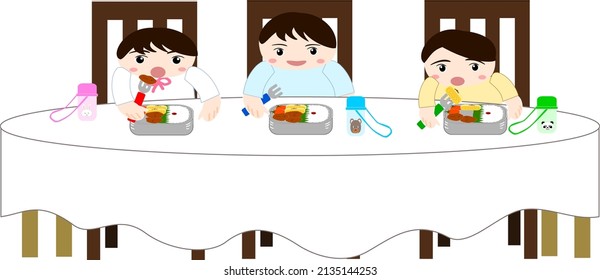 Three kids eating lunch at the table