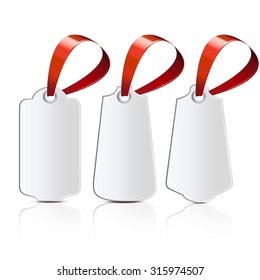 Three labels with red ribbons on a white background with reflection