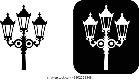 Three lantern street lamp post silhouettes
