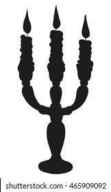 Three large wax blazing candle on old-fashioned baroque elegant brass sconce. Black ink drawn background with space for text