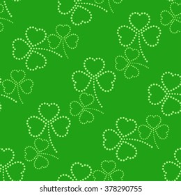 Three leaves clover dotted Seamless Pattern. Floral green background. St. Patrick's day symbol. Abstract background. Vector Illustration.