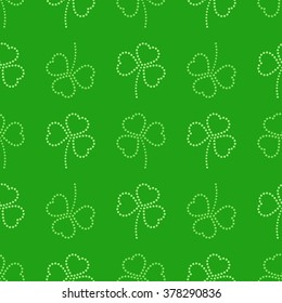 Three leaves clover dotted Seamless Pattern. Floral green background. St. Patrick's day symbol. Abstract background. Vector Illustration.