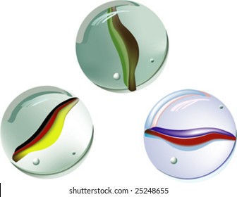 three marbles on white
