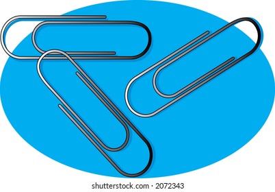 Three metal paper clips on a blue background