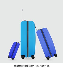 three modern suitcases on wheels ready to travel