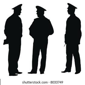 Three officers of policemen on work discuss task