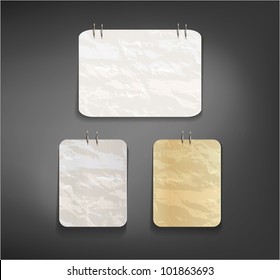 Three old paper cards on pin