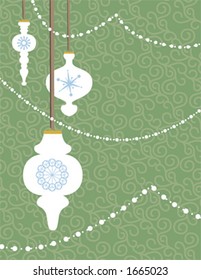 Three ornaments hang on a tree decorated with pearl strings.
