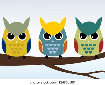 three owls sitting on a branch