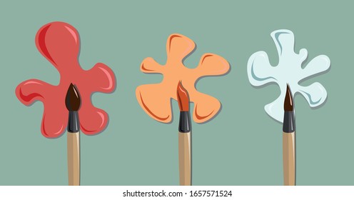 three paint brushes and paint blots