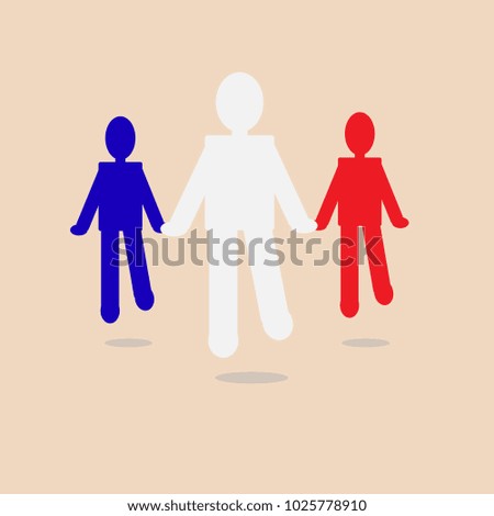 Three people hold hands.