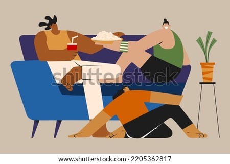 Three Persons Chilling Out Around a Couch