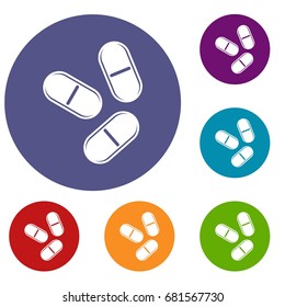 Three pills icons set in flat circle red, blue and green color for web