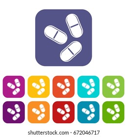 Three pills icons set vector illustration in flat style In colors red, blue, green and other