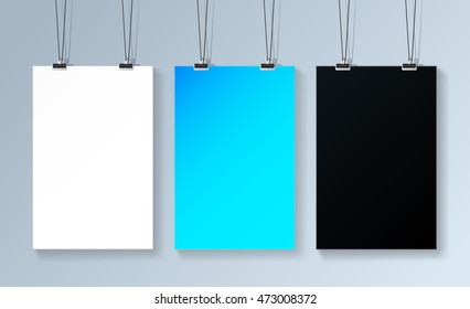 Three poster mockup hanging on the wall for your presentation.