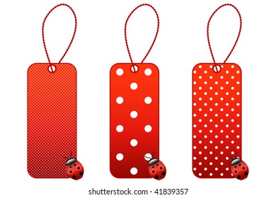 Three price tags with strings and ladybugs