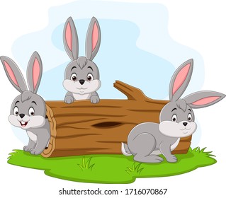 Three rabbit cartoon playing in the log