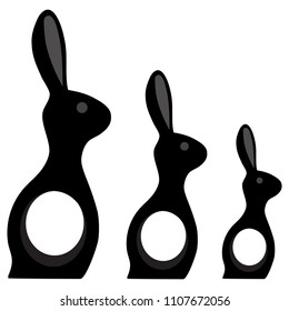 Three rabbits stand one by one. Abstract figurines. Vector illustration.