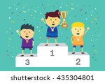 Three ranking winner kids standing on the winning podium holding up winning trophy.