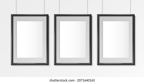 Three Realistic Black Vertical A4 frames. Posters on wall Mock-up. Frames Design Template for Mockup. Vector illustration