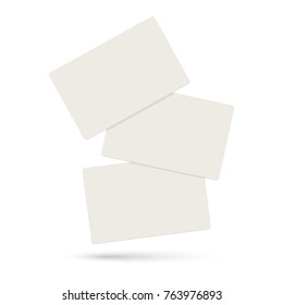 Three Realistic Blank Plastic Credit Cards Flying In The Air On A White Background. The Discount Or Savings Card. Vector  Illustration.