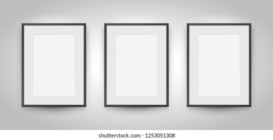 Three realistic empty rectangular black frames with passepartout on gray background, border for your creative project, mock-up sample, picture on the wall, vector design object