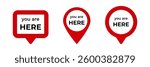 Three red location markers with text, in different shapes. each marker has a unique design.