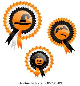 Three ribbon medals with Halloween symbols