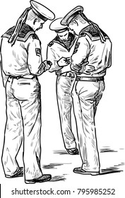  Three sailors with the cell phones