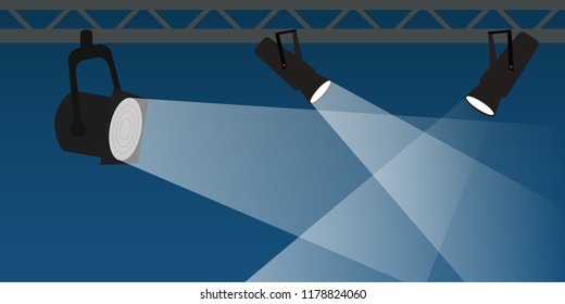 Three searchlights on blue background