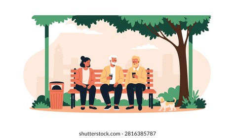 Three senior friends sitting on bench in park talking and holding coffee cups with a small dog under a green tree.