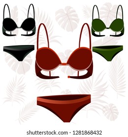 Three sets of women's underwear of dark shades. Against the background of fern leaves.