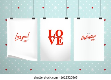 Three sheets of paper with inscriptions about love hang on clips on a background of a wall with polka dots, hearts and snowflakes. Realistic mockup for Valentine's Day or wedding