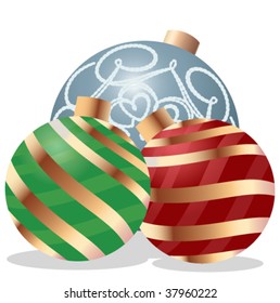 Three shiny Christmas ornaments.