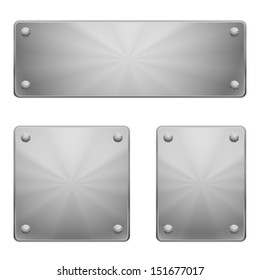 Three shiny metal plates of different size with rivets. 