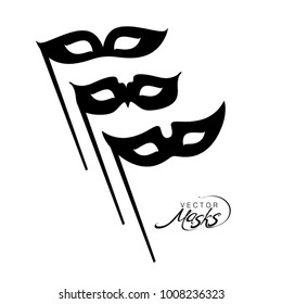 Three silhouettes of carnival masks. Flat vector design.