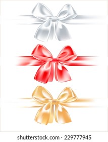 Three silk bow - white, red and gold.