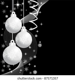 three  silver  christmas balls on  black background