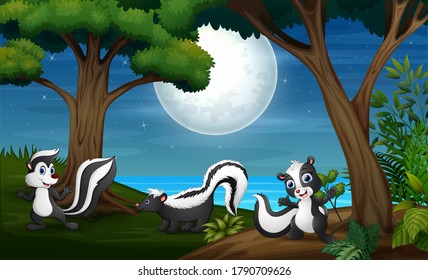 Three skunk in the forest at night