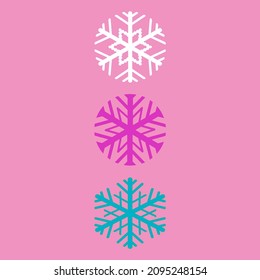 Tres copos de nieve de diferentes colores sobre un fondo rosado.