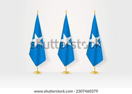 Three Somalia flags in a row on a golden stand, illustration of press conference and other meetings. Vector illustration.