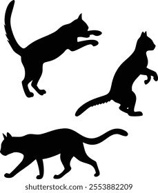 Three Stylized Black Silhouette Cats in Various Poses