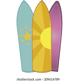 three surfboards with some design and textures within them