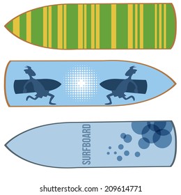 three surfboards with some designs and textures within them