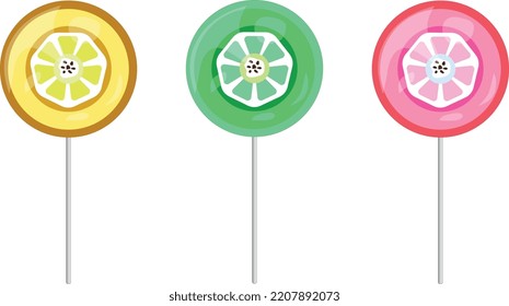 three sweet candies on sticks