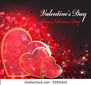 Three transparent hearts in a gold frame on a sparkling background with set of small hearts