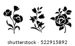 Three vector black silhouettes of flowers isolated on a white background.