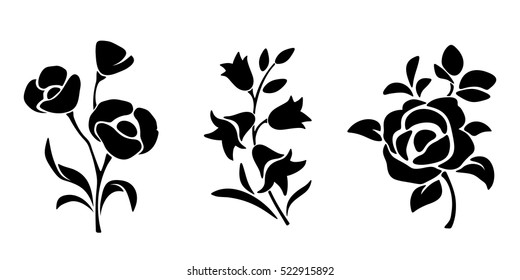 Three vector black silhouettes of flowers isolated on a white background.