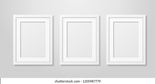 Three Vector Realistic Modern Interior Black Blank Vertical A4 Wooden Poster Picture Frame Set Closeup on White Wall Mock-up. Empty Poster Frames Design Template for Mockup, Presentation