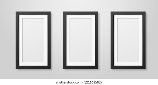 Three Vector Realistic Modern Interior Black Blank Vertical Wooden Poster Picture Frame Set Closeup on White Wall Mock-up. Empty Poster Frames Design Template for Mockup, Presentation